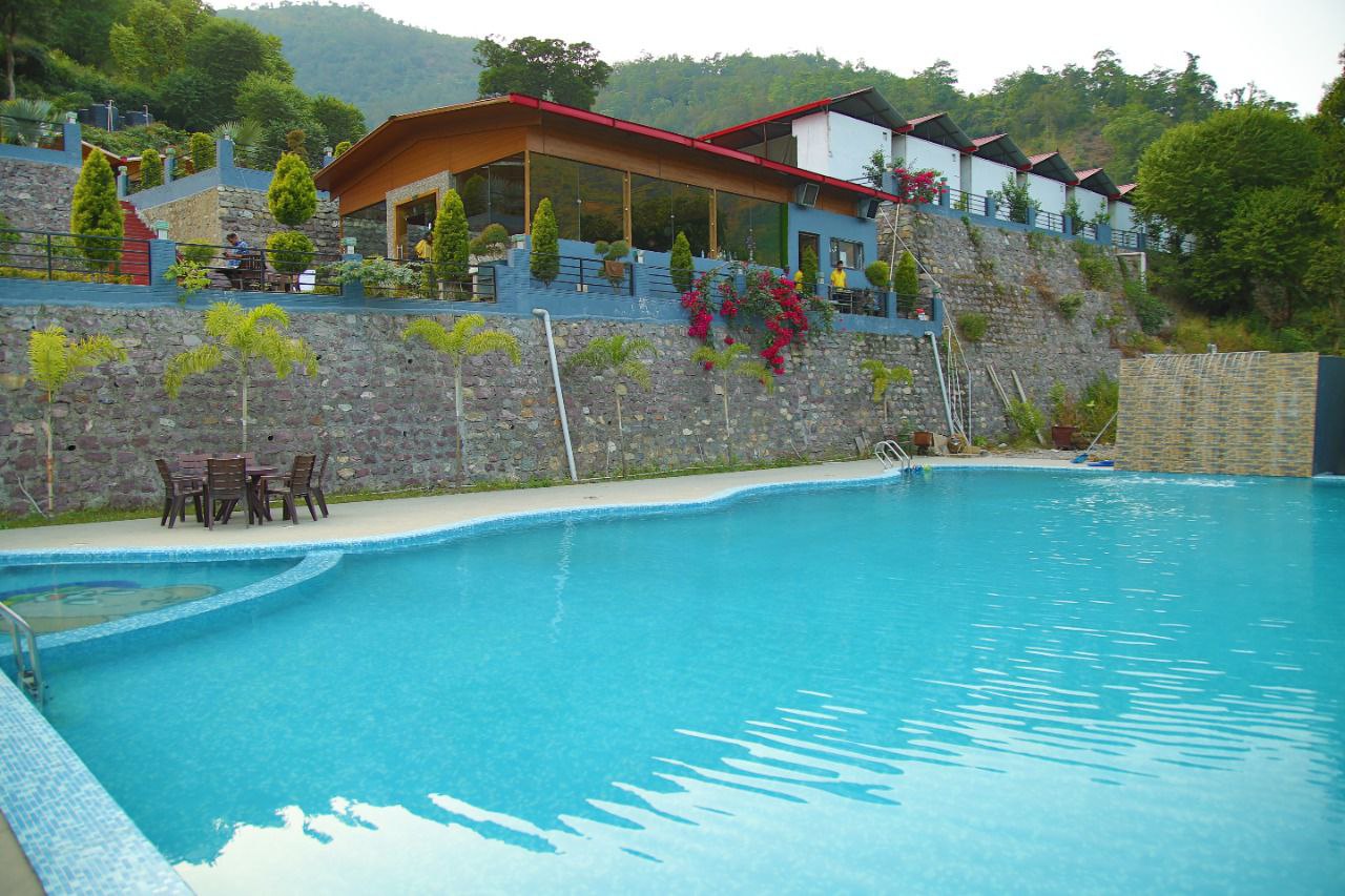 Resort with a swimming pool in rishikesh - HOA Resort in Rishikesh